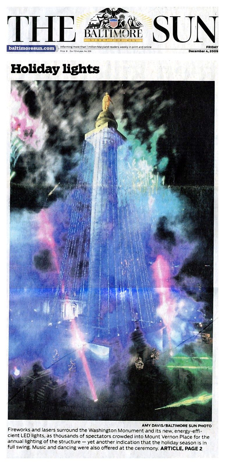 Baltimore Sun front page photo of fireworks and lasers around the Washington Monument